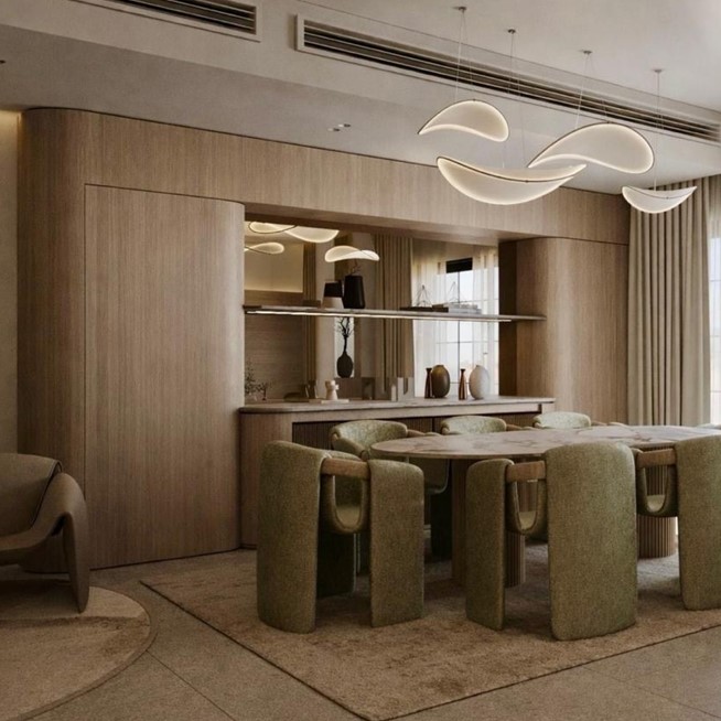 Sodic East Home — dining area with timber joinery and sculptural pendants